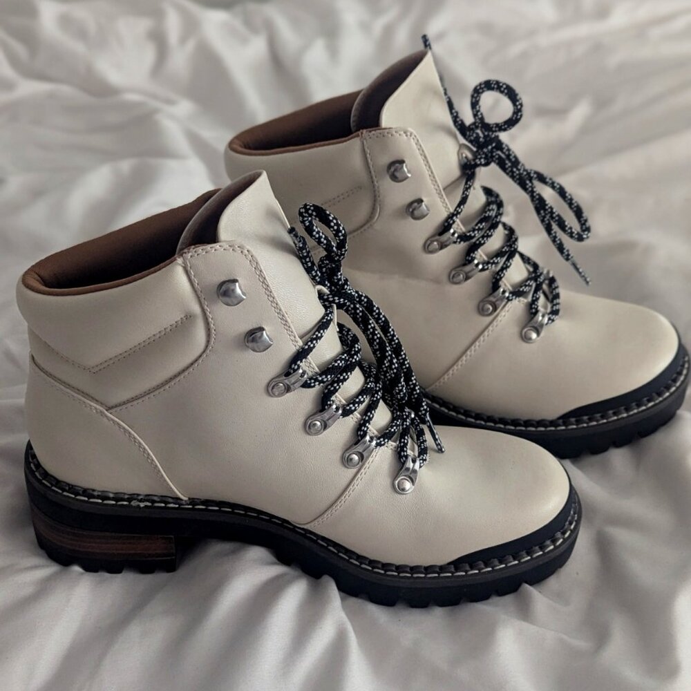 Brand new White short boots with chunky black heel